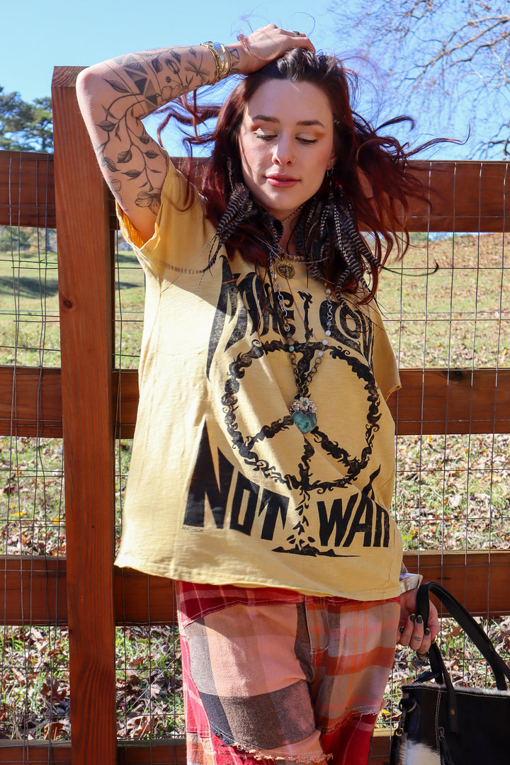 Moon Dance Distressed Make Love Not War Tee Top in Mustard Peace