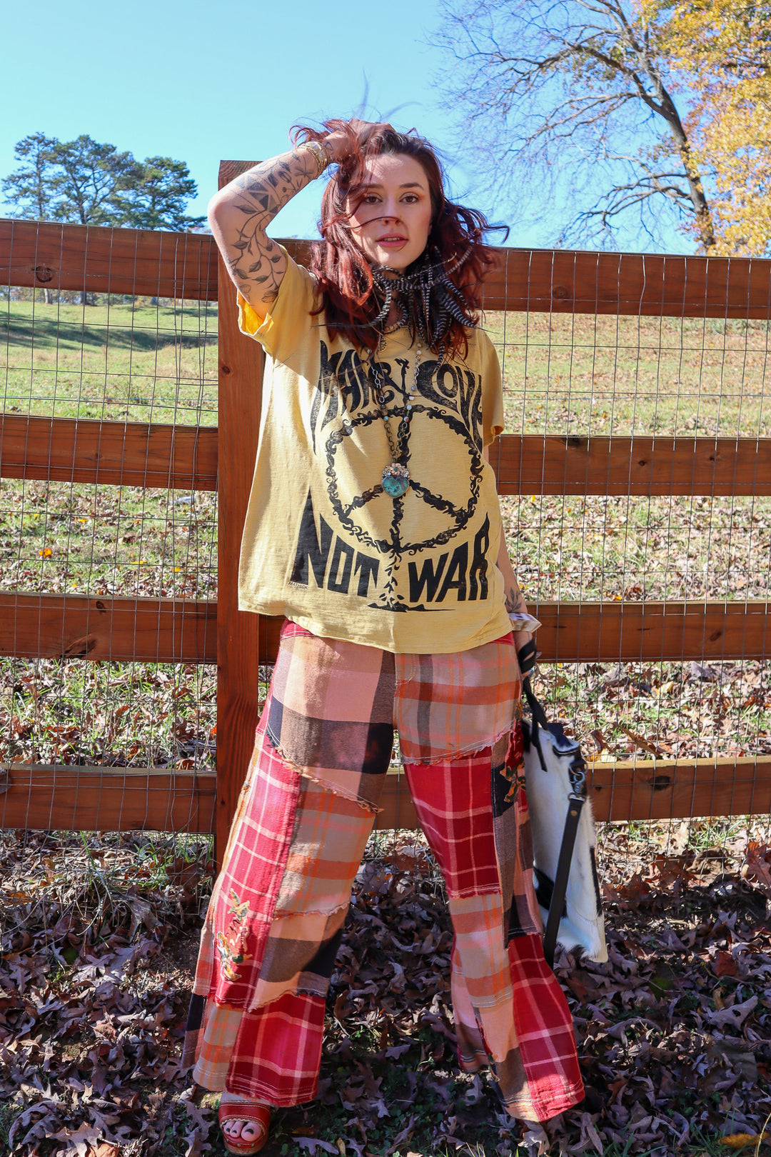 Moon Dance Distressed Make Love Not War Tee Top in Mustard Peace